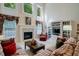 A cozy living room with a fireplace, entertainment center, and comfortable seating at 1192 Lake Washington Dr, Lawrenceville, GA 30043