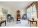 Cozy living room featuring stylish furnishings, a large window, and decorative accents at 1192 Lake Washington Dr, Lawrenceville, GA 30043