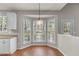 Breakfast nook with bay window and pendant lighting at 7045 Threadstone Overlook, Johns Creek, GA 30097