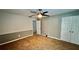 This cozy bedroom features neutral walls, plush carpeting, and a ceiling fan for added comfort at 81 Richmond Way, Villa Rica, GA 30180