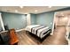 Comfortable bedroom featuring hard surface floors, and a cozy bed at 81 Richmond Way, Villa Rica, GA 30180