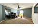 This flexible bedroom offers a work space with natural light from the window at 81 Richmond Way, Villa Rica, GA 30180