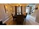 Formal dining room featuring stylish chandelier and wood floors at 81 Richmond Way, Villa Rica, GA 30180