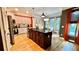 Well-lit kitchen with stainless appliances, granite counters, and island at 81 Richmond Way, Villa Rica, GA 30180