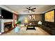 Spacious living room with a brick fireplace and large windows at 81 Richmond Way, Villa Rica, GA 30180