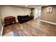 Inviting living room featuring hard surface floors, ample space and recessed lighting at 81 Richmond Way, Villa Rica, GA 30180