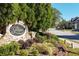 An inviting entrance to The Georgian community, surrounded by lush landscaping and well-maintained greenery at 81 Richmond Way, Villa Rica, GA 30180