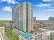 Luxury high rise condo with rooftop pool, beautiful views, and modern architecture at 860 Peachtree Ne St # 1511, Atlanta, GA 30308
