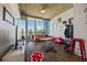 Bright living room with floor to ceiling windows showcasing city views and wood floors at 860 Peachtree Ne St # 1511, Atlanta, GA 30308
