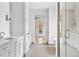 Bathroom boasts double vanity, glass enclosed shower, stylish lighting, and a tranquil design at 98 Sheridan Dr, Atlanta, GA 30305