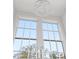 Bathroom window with a view features a crystal chandelier, chrome faucet and natural light at 98 Sheridan Dr, Atlanta, GA 30305
