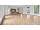 Bright, open-concept living space with hardwood floors and an eat-in kitchen featuring a marble countertop island at 98 Sheridan Dr, Atlanta, GA 30305