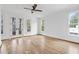 Spacious main bedroom with hardwood floors, ceiling fan and windows offering great views at 98 Sheridan Dr, Atlanta, GA 30305