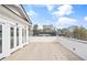 Rooftop deck with light wood and views of the surrounding city skyline at 98 Sheridan Dr, Atlanta, GA 30305