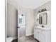 Bathroom with a new vanity and stainless steel fixtures, with view to bedroom at 5017 Tanaga Ct, Stone Mountain, GA 30087