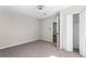 Bedroom featuring a closet with bifold doors and a ceiling fan at 5017 Tanaga Ct, Stone Mountain, GA 30087