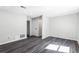 Living room featuring gray flooring, white walls, and recessed lighting at 5017 Tanaga Ct, Stone Mountain, GA 30087