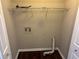 Functional laundry room featuring ample storage and modern hookups at 5942 King Way Walk, Lithonia, GA 30058