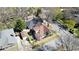 Aerial view of a neighborhood featuring a well-maintained house with a brown roof at 1448 N Highland Ne Ave, Atlanta, GA 30306