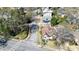 An aerial view of a charming home on a tree-lined street with well-manicured lawns and beautiful surroundings at 1448 N Highland Ne Ave, Atlanta, GA 30306