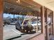 A glimpse through the window of Alon's Bakery, showcasing pastries, breads, and sandwiches at 1448 N Highland Ne Ave, Atlanta, GA 30306