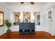 Bright foyer featuring white brick walls, a blue dresser, and tile flooring at 1448 N Highland Ne Ave, Atlanta, GA 30306