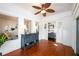 Bright foyer featuring white brick walls, a blue dresser, and tile flooring at 1448 N Highland Ne Ave, Atlanta, GA 30306