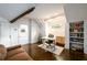 Upper level loft area with a desk, bookcase, a comfortable couch, and a modern style at 1448 N Highland Ne Ave, Atlanta, GA 30306