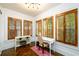Bright office space with multiple windows, wooden shutters, and classic parquet flooring at 1448 N Highland Ne Ave, Atlanta, GA 30306