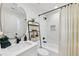A cozy bathroom with a modern vanity, toilet and a shower over tub at 969 Parsons Sw St, Atlanta, GA 30314