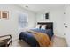 This cozy bedroom features a comfortable bed with stylish bedding, soft natural light, and a neutral color palette at 969 Parsons Sw St, Atlanta, GA 30314