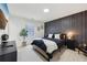 A contemporary bedroom featuring a stylish accent wall and modern decor at 969 Parsons Sw St, Atlanta, GA 30314