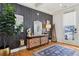Stylish entryway featuring hardwood floors, decorative console, and a view to the outside at 969 Parsons Sw St, Atlanta, GA 30314