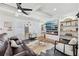 Bright living room with coffered ceiling, modern fireplace, and large windows at 969 Parsons Sw St, Atlanta, GA 30314