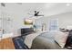 A bright and modern bedroom with a view into the ensuite bathroom at 969 Parsons Sw St, Atlanta, GA 30314