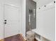 Entryway featuring coat hooks, bench seating and storage at 969 Parsons Sw St, Atlanta, GA 30314