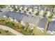 An aerial view of multiple backyards and home exteriors in a well-kept neighborhood at 5638 Maple Bluff Way, Hoschton, GA 30548