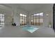 Indoor hot tub surrounded by large windows and modern design at 5638 Maple Bluff Way, Hoschton, GA 30548