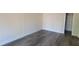 Neutral bedroom with wood floors and natural light at 1 Hidden Valley Dr, Lawrenceville, GA 30044