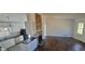 Open-concept layout with kitchen, fireplace, and living room at 1 Hidden Valley Dr, Lawrenceville, GA 30044