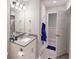 Bright bathroom featuring a vanity with granite countertop and updated fixtures at 261 Webster Lake Dr, Temple, GA 30179