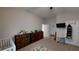 A bedroom with dressers, storage, and a bright ABC play carpet at 261 Webster Lake Dr, Temple, GA 30179