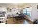 Cozy dining area with a modern table, seating for six, and ample natural light at 261 Webster Lake Dr, Temple, GA 30179