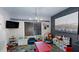 Spacious playroom with a colorful rug, learning materials, and large windows for plenty of natural light at 261 Webster Lake Dr, Temple, GA 30179