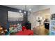 Stylish playroom offers a fun space with artwork, and easy access to the kitchen and other living areas at 261 Webster Lake Dr, Temple, GA 30179