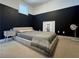 Bedroom showcasing a neutral palette, platform bed, and unique half-wall paint design at 2630 Talley St # 426, Decatur, GA 30030