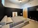 Comfortable bedroom featuring sleek platform bed, black accent wall, and modern decor at 2630 Talley St # 426, Decatur, GA 30030