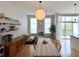 Open-concept living room with a dining area, modern furnishings, and bright natural light at 2630 Talley St # 426, Decatur, GA 30030