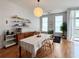 Bright and airy living room with modern furnishings, shelving, and access to a balcony at 2630 Talley St # 426, Decatur, GA 30030