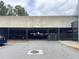 Exterior view of building's gated parking garage at 2630 Talley St # 426, Decatur, GA 30030